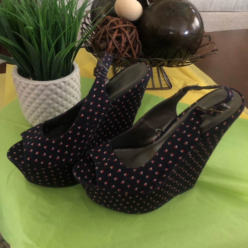 Wedge heeled sling back peep toe sandals